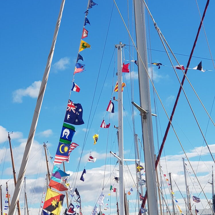 Code flags all over a boat