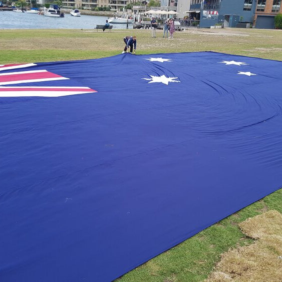 Large helicopter flag out in a park
