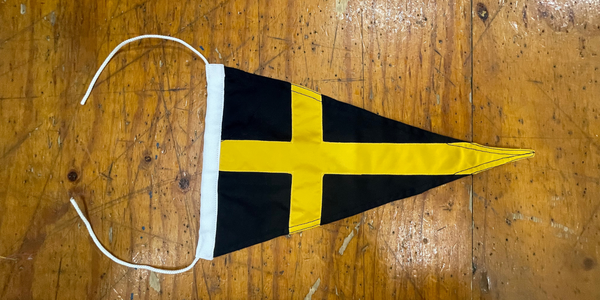 Black pennant with yellow cross