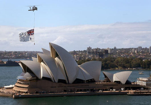 White ensign helicopter flag flying over opera house