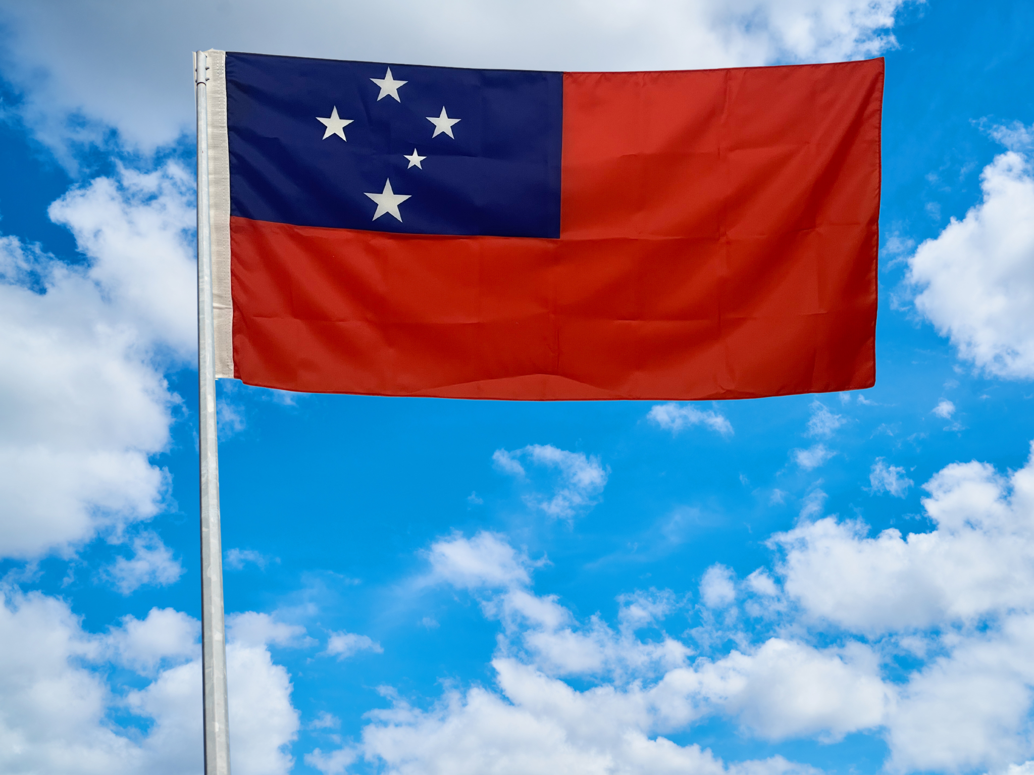 Samoan flag flying on pole
