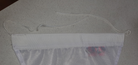 Header with tail and tail finish