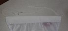 Header with tail and tail finish