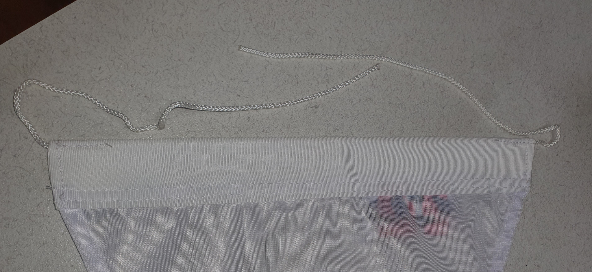 Header with tail and tail finish