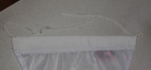 Header with tail and tail finish