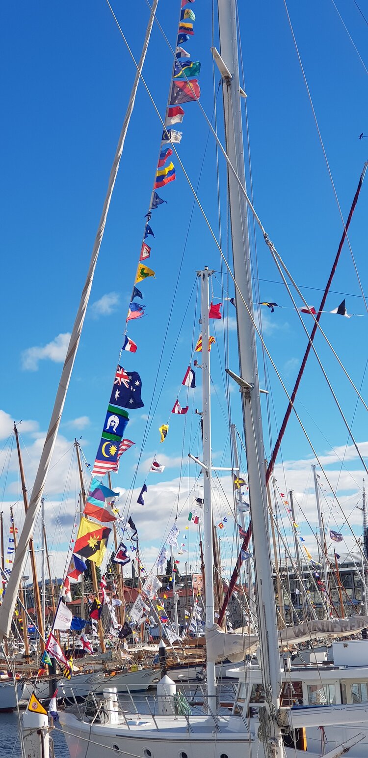 Code flags all over a boat