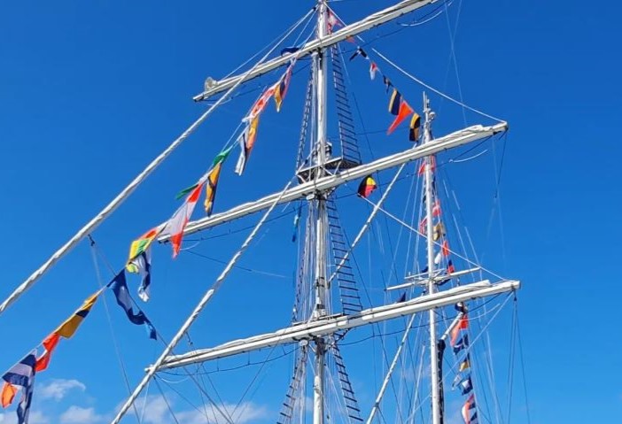 Code flags dressing a ship