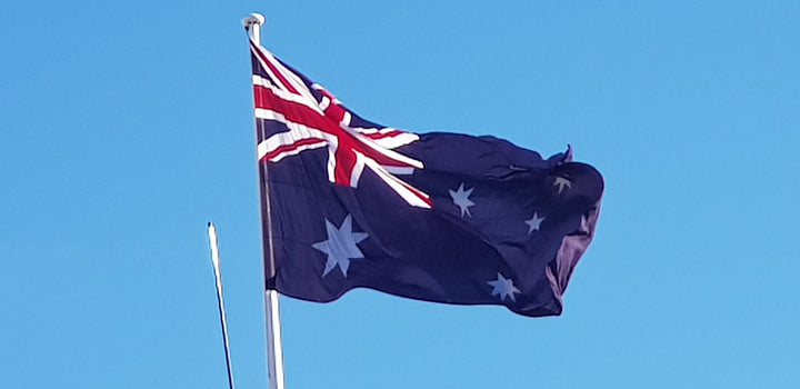 Large Australian Flag flying on a pole