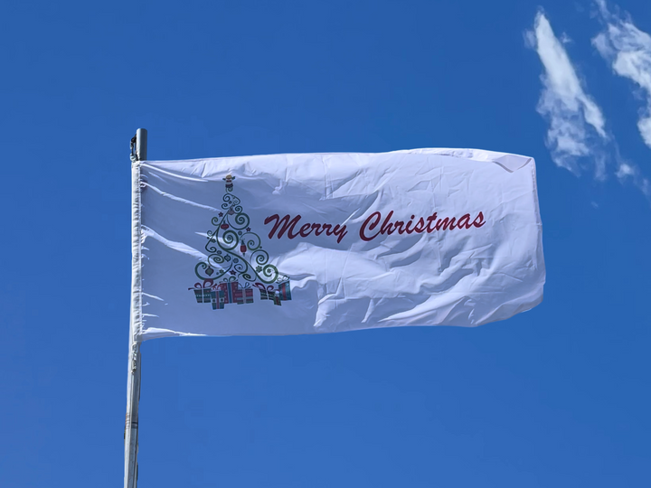 Merry Christmas Flag Flying on Flag Pole